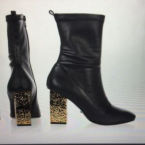 Never worn Topshop boots with gold heels